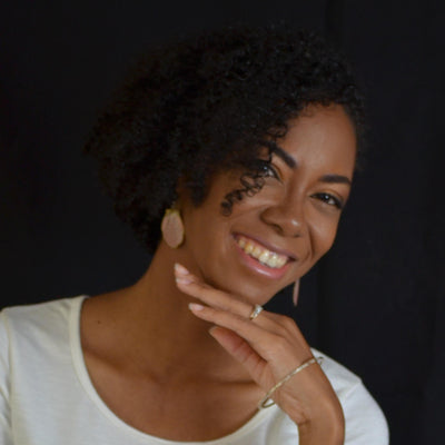 Woman with a smile on a black background
